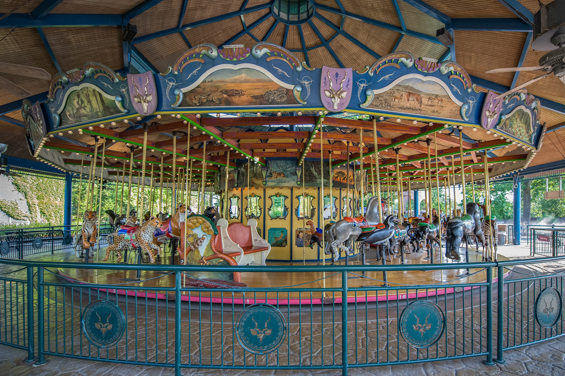 The Conservation Carousel at the St Louis Zoo includes hand-carved wooden animal sculptures, representing protected and endangered species.