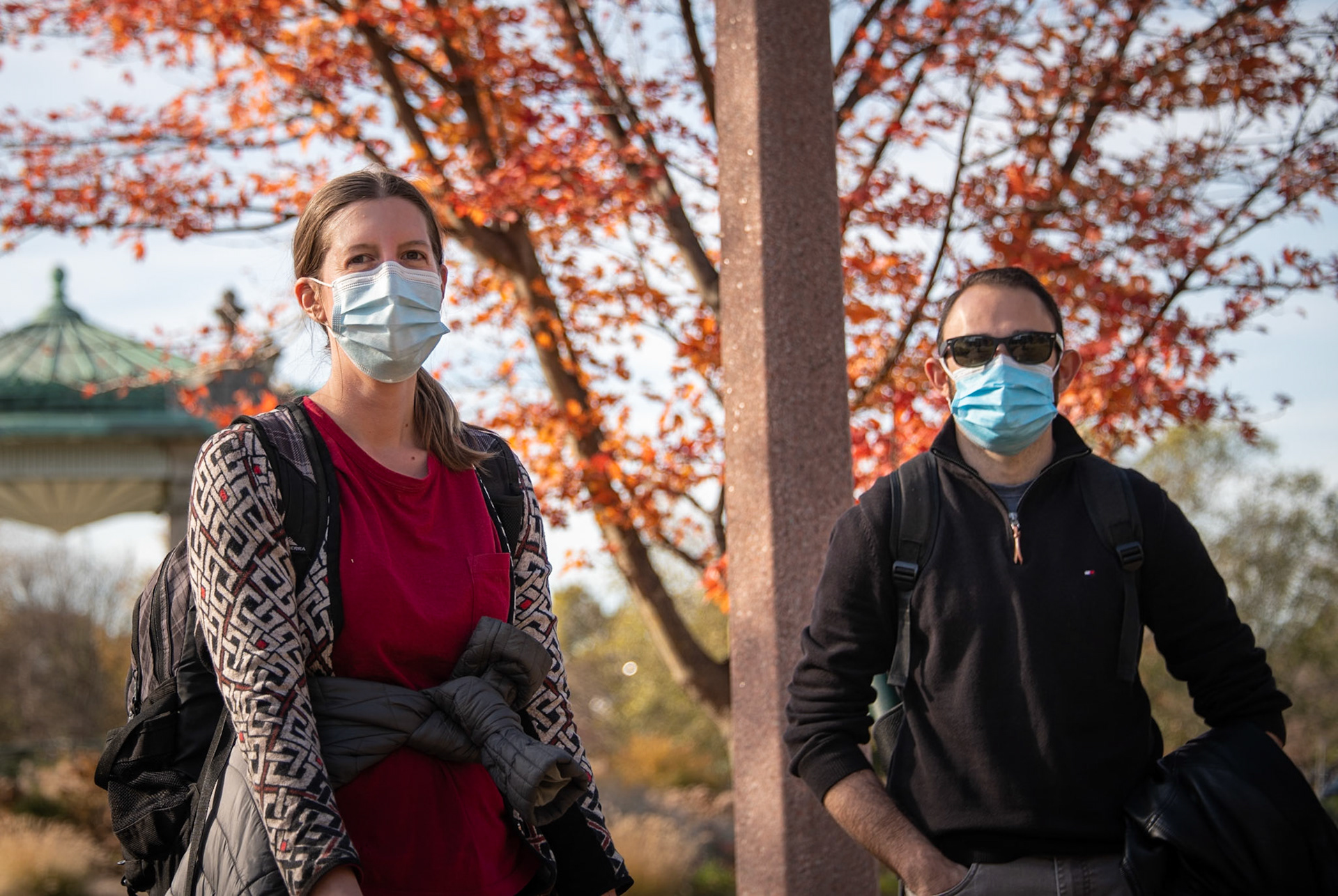 I found a group of friends out enjoying time together in the park. Some had dogs. All wore masks. There were more friends than the photos show, but the three in front stopped to speak with me.  I asked if they always wear face masks outside. I saw nods and heard, "Pretty much, yes". So, I asked if they feel like they're used to it at this point. The woman admitted that she doesn't really like wearing face masks, but she's used to it and good with it.  She walks in the city a lot, so she wears them regularly on city streets. If she finds herself somewhere without many people around, she does occasionally take them off. Her friend with the sunglasses responded similarly. I was especially interested in what the bicyclist would tell me, because I've begun seeing more "humans" riding bikes while wearing masks. (I've tried it myself and know that it can be challenging.) "Do you wear a mask while riding?", I asked. He said he does if he is riding casually, like in the park where other people are around. If he is riding on roads, in traffic, he may take the mask off. I appreciated that he is balancing COVID-19 safety with traffic safety.