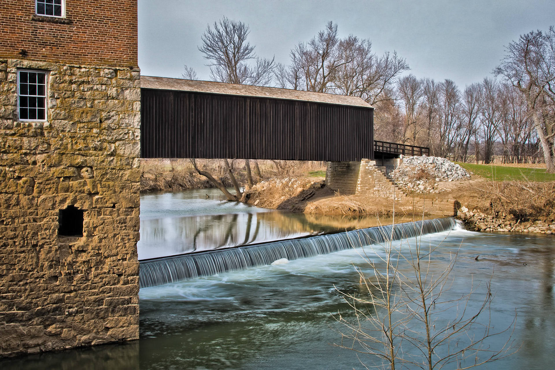 The Burfurdville Covered Bridge is the oldest remaining Covered Bridge in Missouri, located at the Bollinger Mill State Historic Site, in Cape Girardeau County, MO. Construction is of the Howe Truss design and began 1858. It is unclear if construction was completed before or after the Civil War.