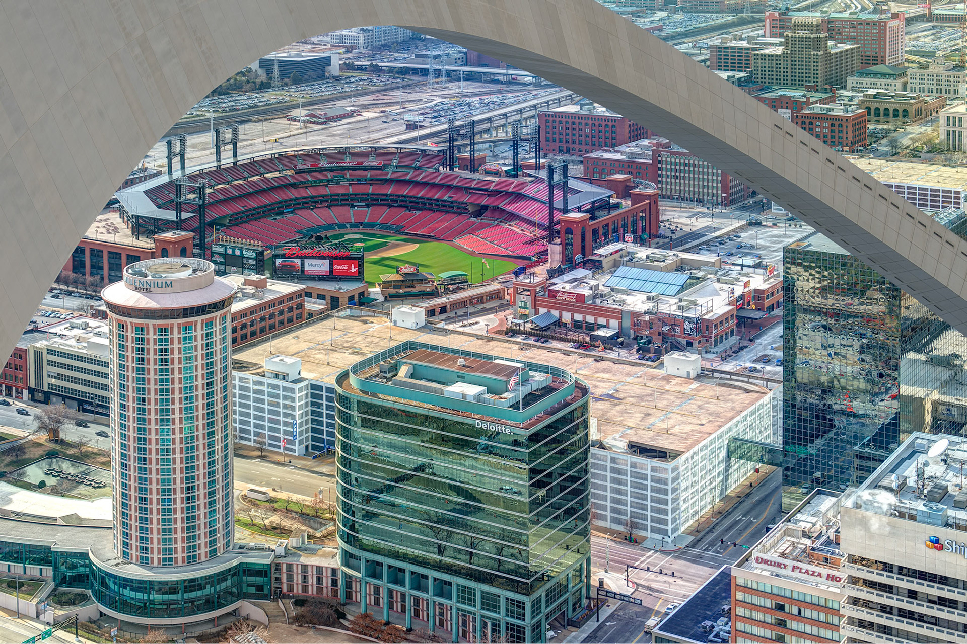 Looking up at the Arch from beneath, looking down toward Busch Stadium from the top of the Arch; composite image