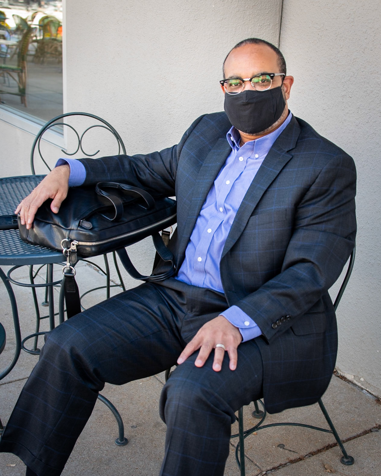 "How do you feel about wearing face masks?", I asked the gentleman seated at the table. "I'm good with wearing them", he replied. "We need to do this if we're going to get through Covid.""Have you found that you've formed any new habits as a result?" He nodded yes. "I'm definitely more intentional when I leave the house these days. I make sure I always have a mask and hand sanitizer with me... oh, and snacks. I don't eat out anymore."His friend and co-worker (in the red) walked by as we were chatting. I noticed that they did a quick elbow bump. The friend joined in on the conversation and agreed, "I'm good with wearing masks". We need to do this to stay safe."