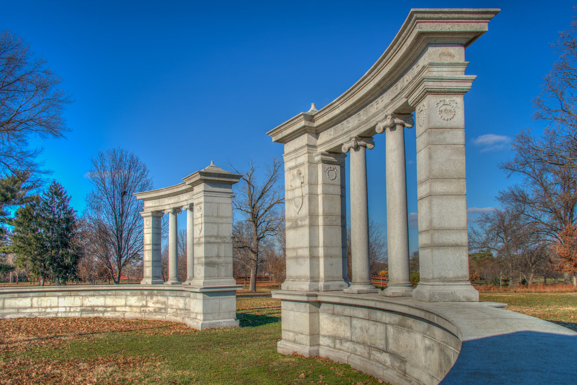 Vandeventer GateThis granite-and-iron entrance gate was installed in Forest Park (near the Jewel Box) in 1950–51. The gate once guarded the east entrance to Vandeventer Place, the most exclusive address in St Louis in the late 19th century. By 1947, the area fell from favor and was razed. The Vandeventer Gate was relocated to Forest Park and is all that remains of a once distinguished neighborhood.