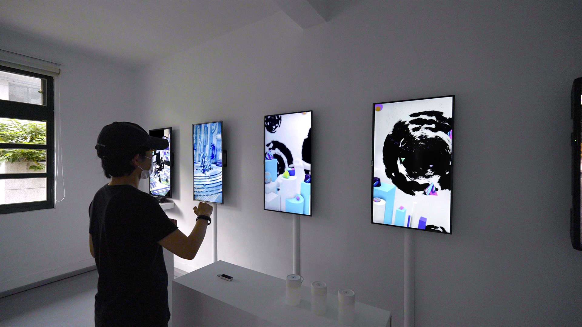 Audience interaction with taste (left) and smell (right) screens to trigger diffusion from the diffusers