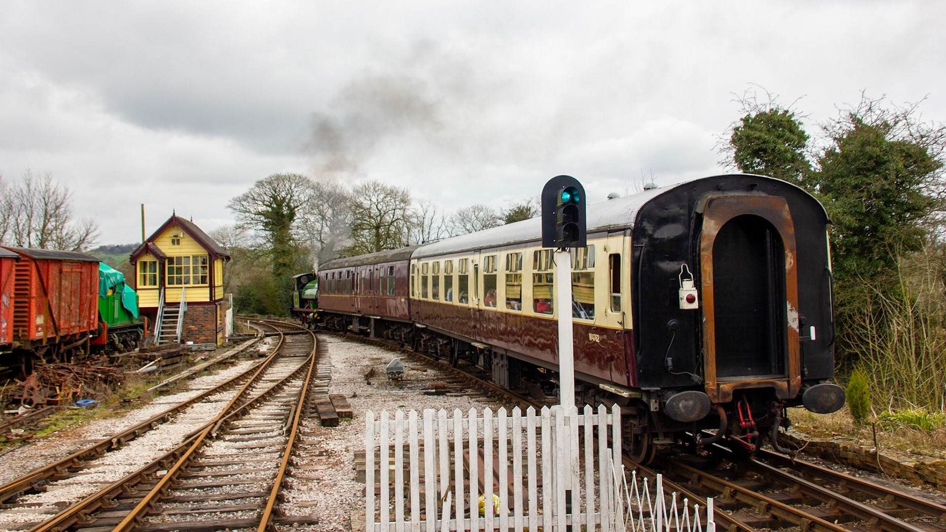 Train pulling away from the platform at Foxfield Railyway