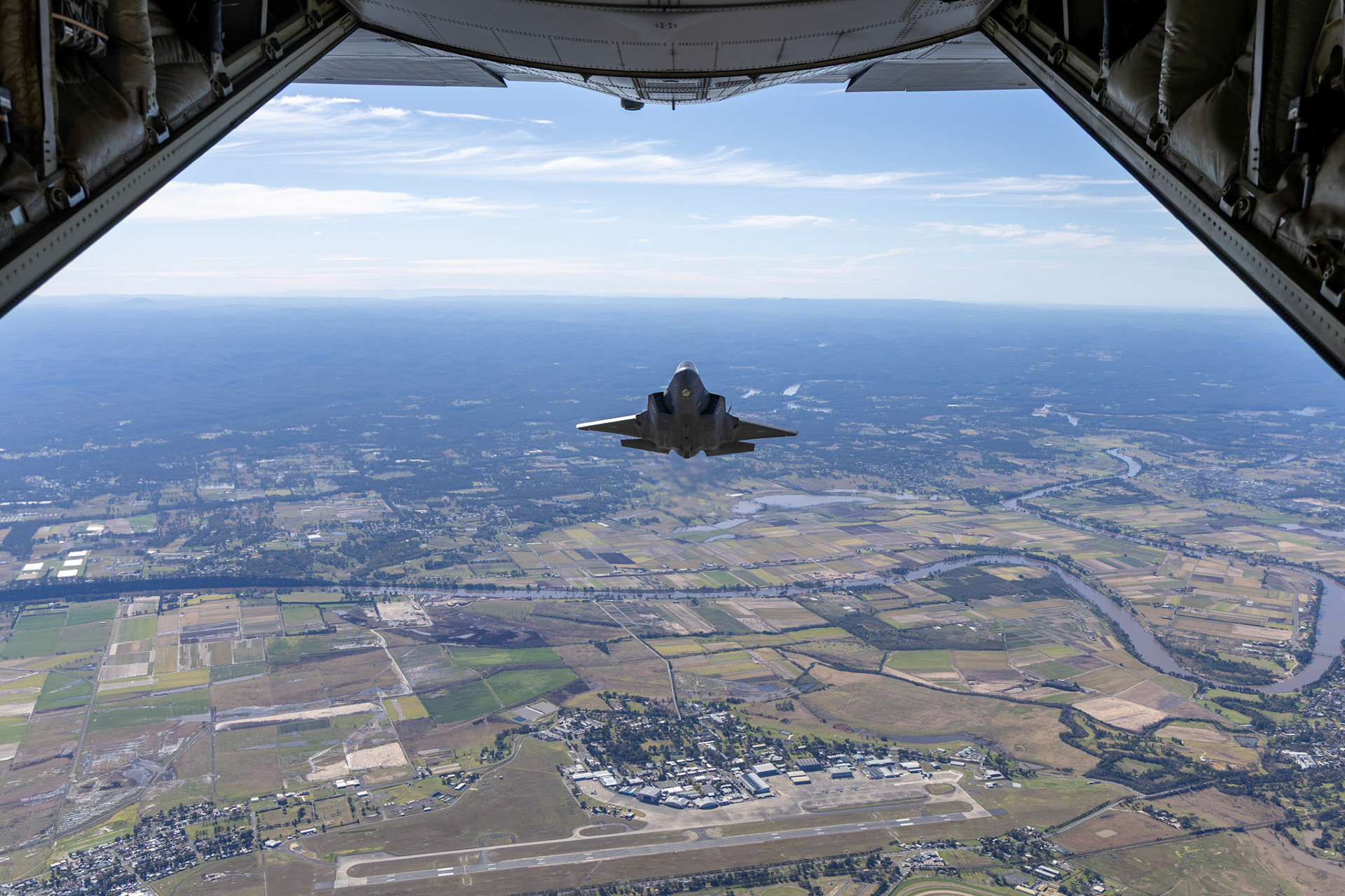 A Royal Australian Air Force F-35A Lightning II aircraft from No 2 Operational Conversion Unit conducts a flight over the Hawkesbury, NSW.