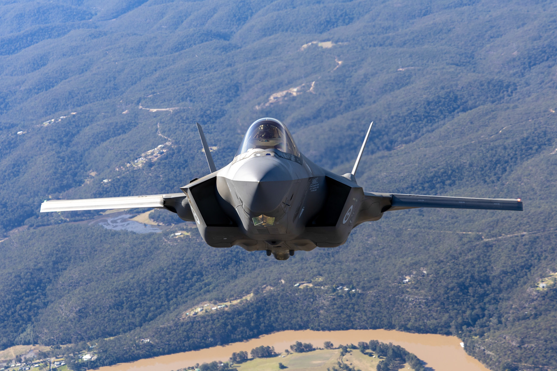 A Royal Australian Air Force F-35A Lightning II aircraft from No 2 Operational Conversion Unit conducts a flight over the Hawkesbury, NSW.