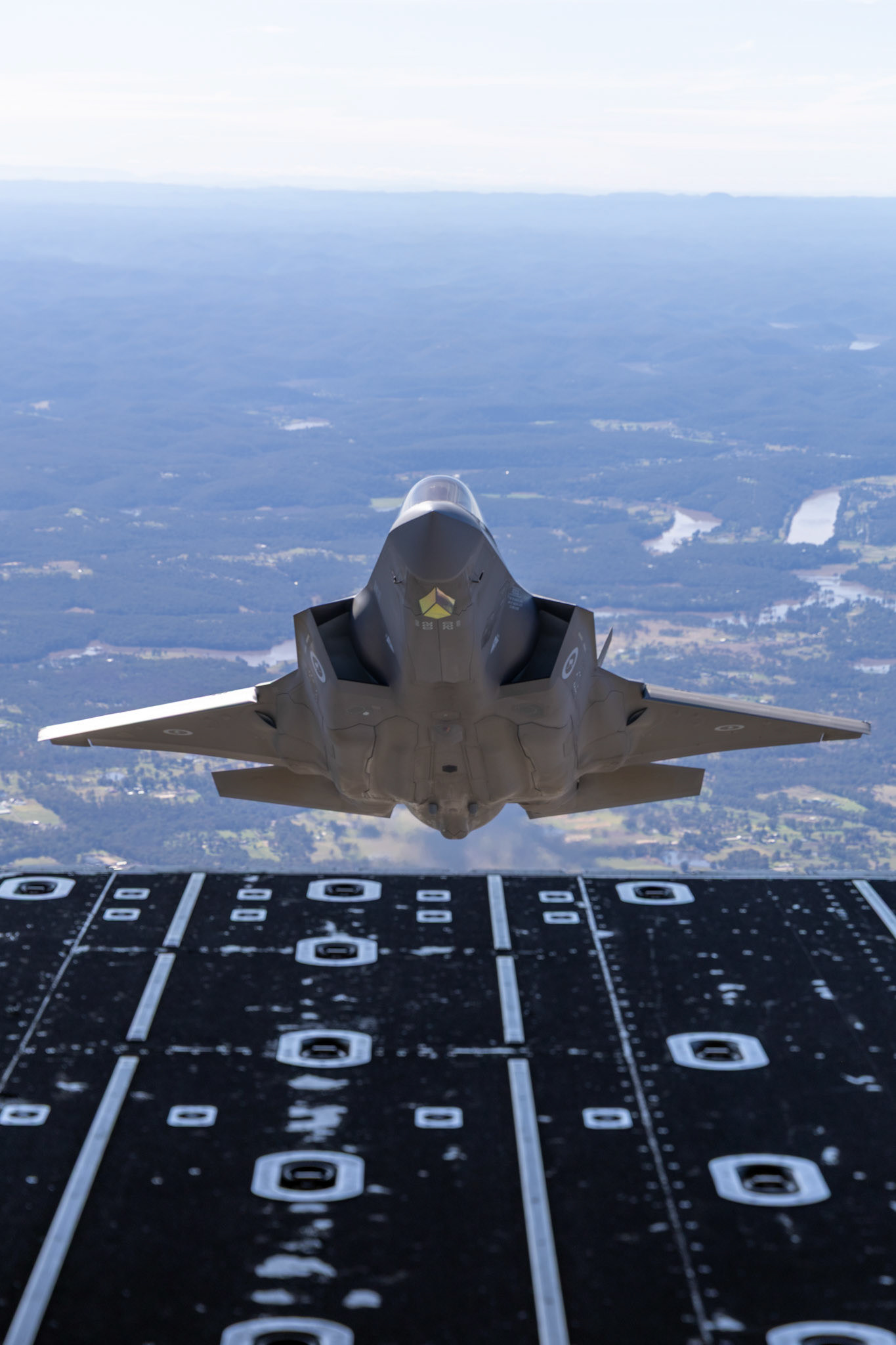 A Royal Australian Air Force F-35A Lightning II aircraft from No 2 Operational Conversion Unit conducts a flight over the Hawkesbury, NSW.