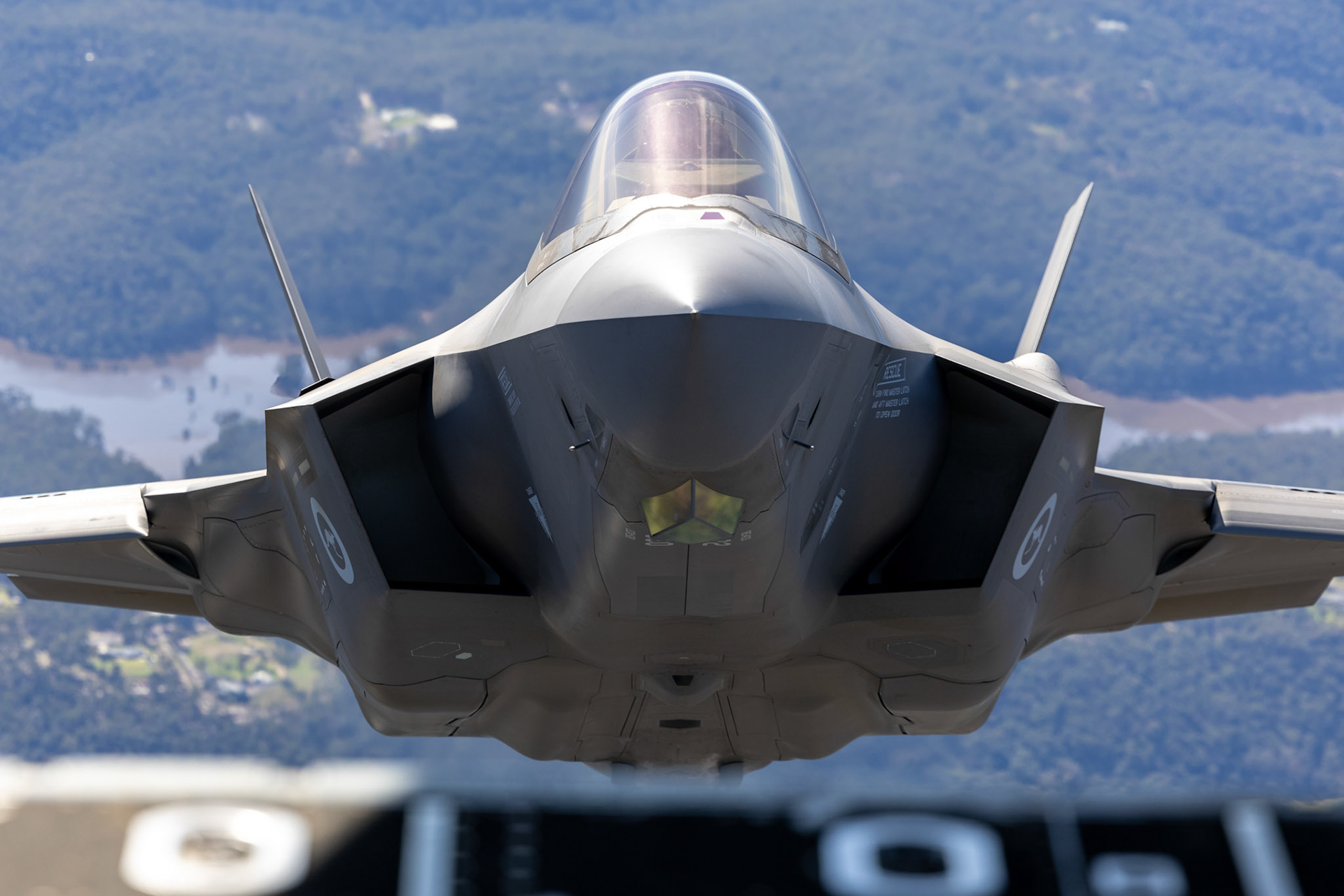 A Royal Australian Air Force F-35A Lightning II aircraft from No 2 Operational Conversion Unit conducts a flight over the Hawkesbury, NSW.