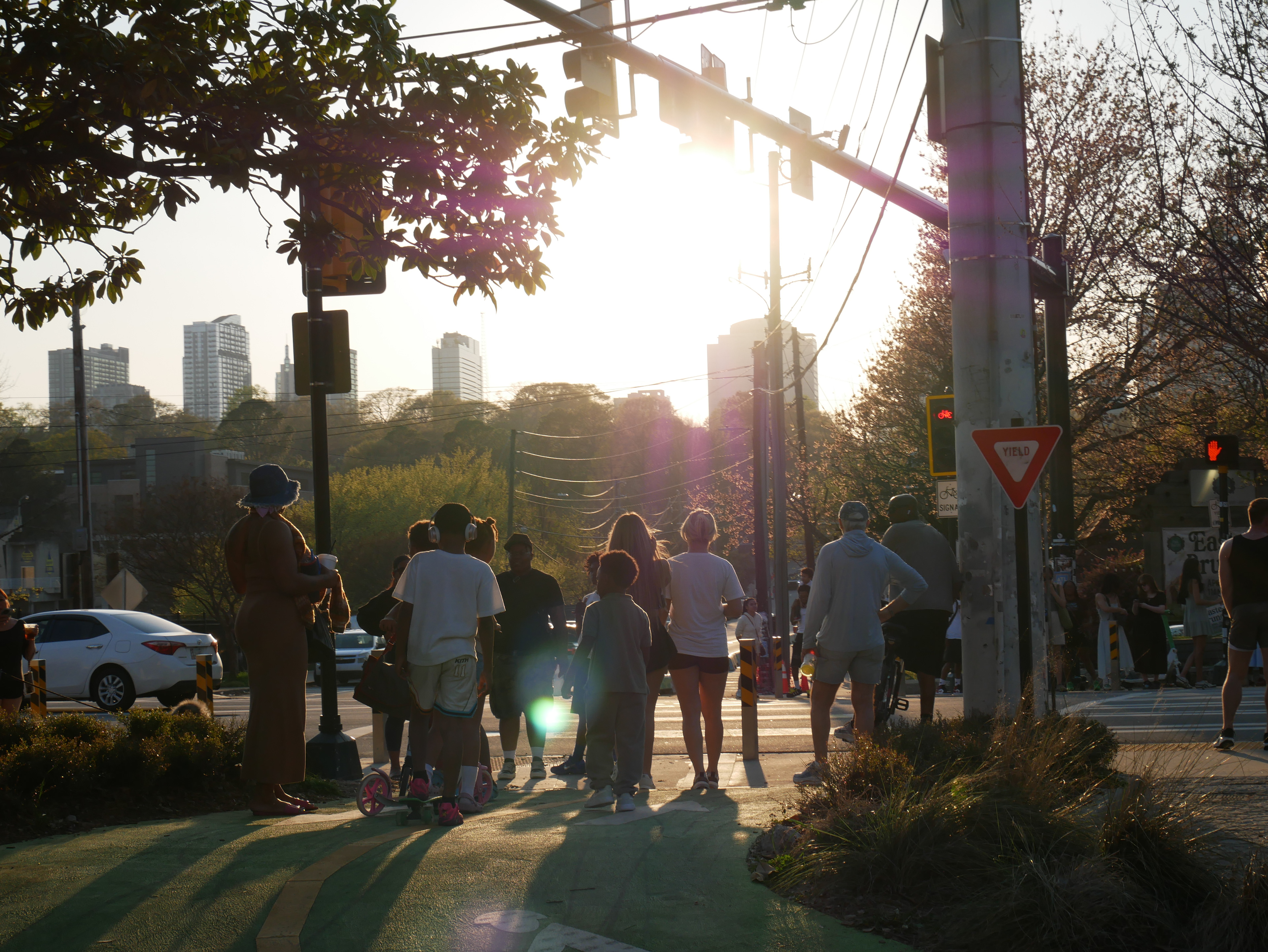 I can hear a crowdy street.