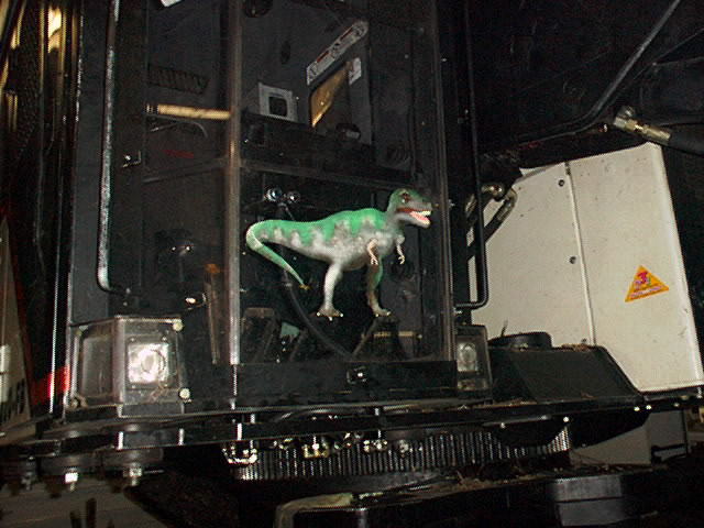 AIRBRUSHED T REX ON FELLER-BUNCHER
