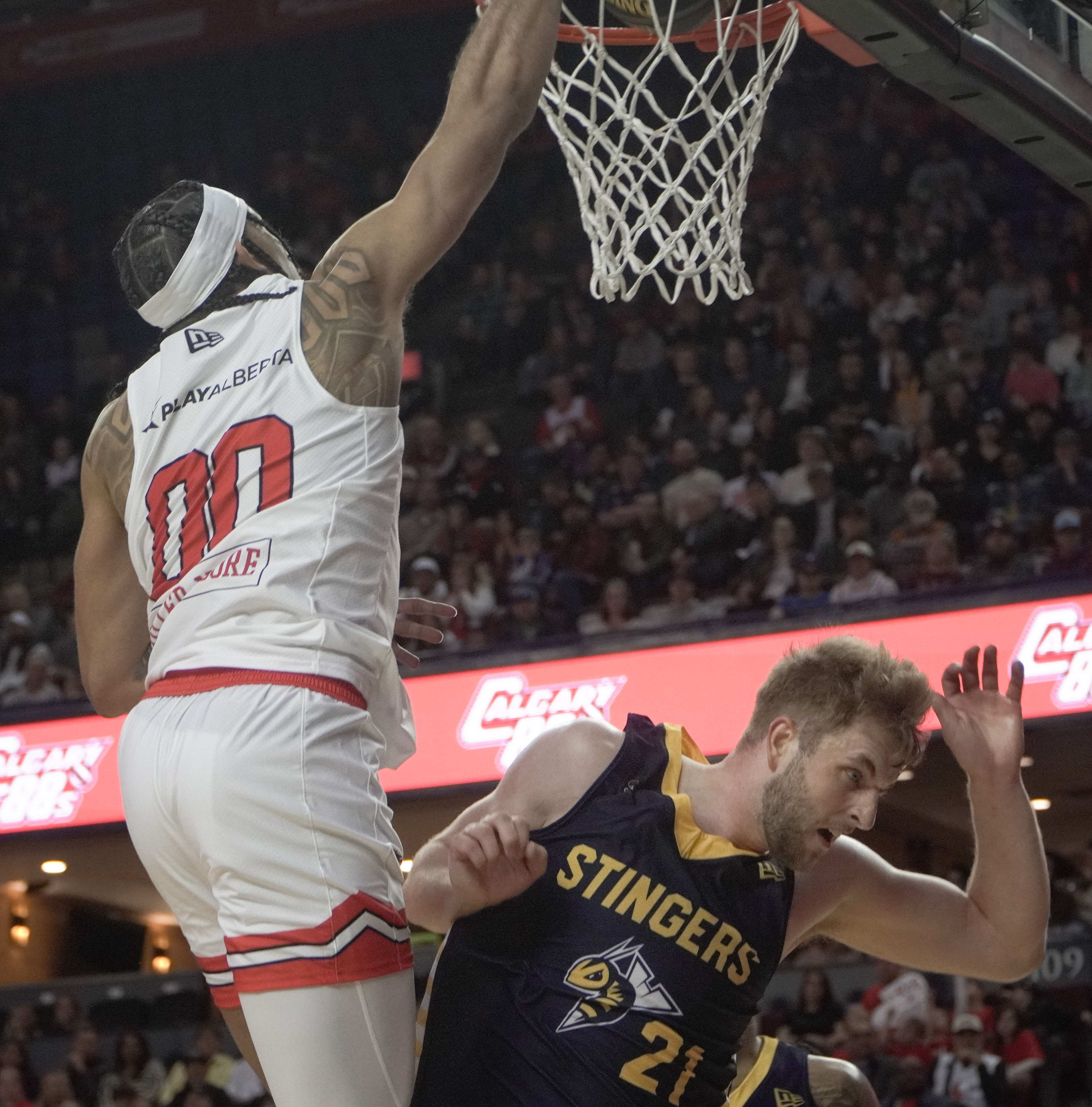 Surge guard Sean (Rugzy) Miller-Moore dunks on Stinger Ben Krikke on May 21, 2024. (Photo by Josiah Navratil/The Press)
