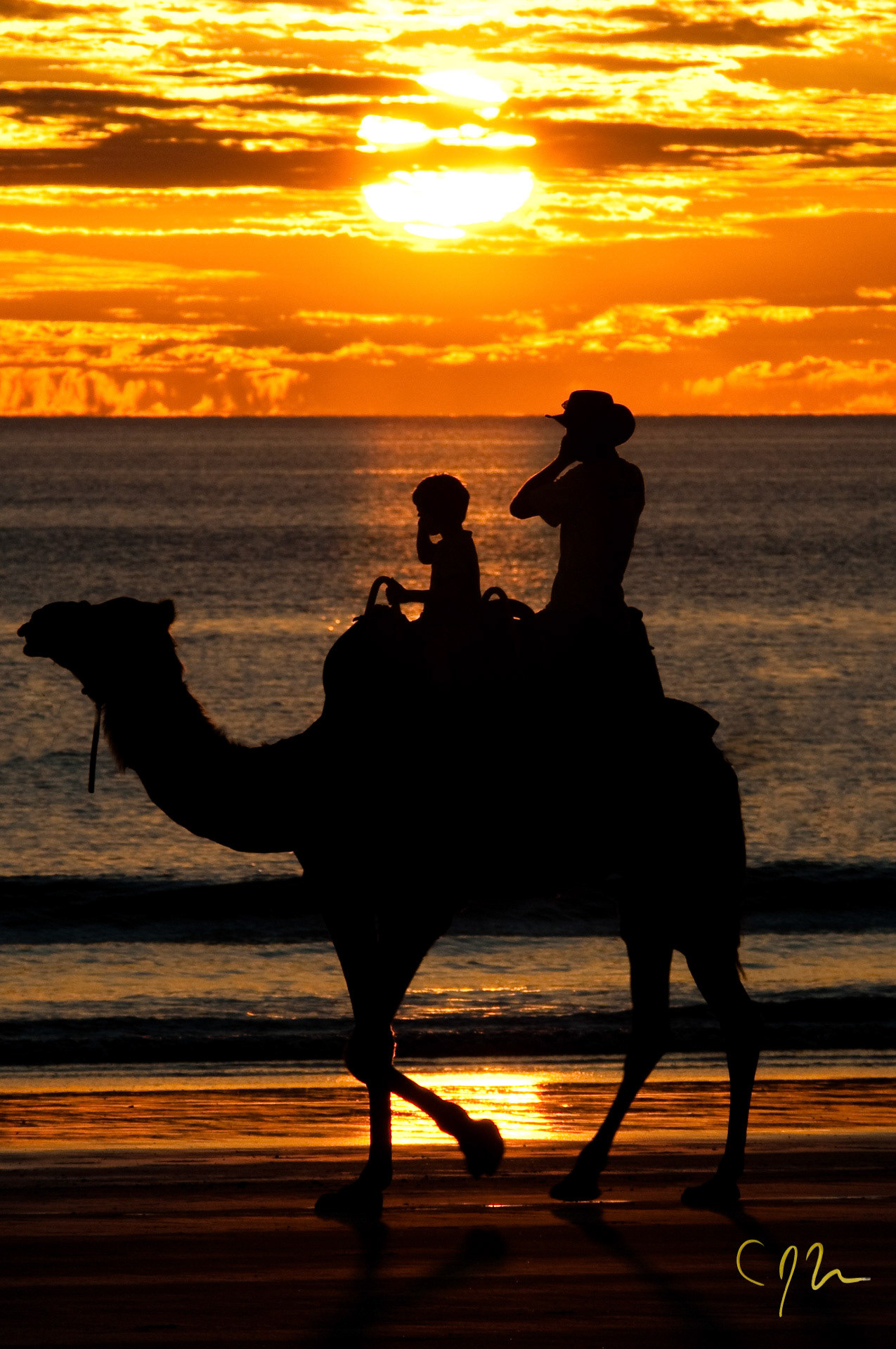 Camel Riders at Sunset