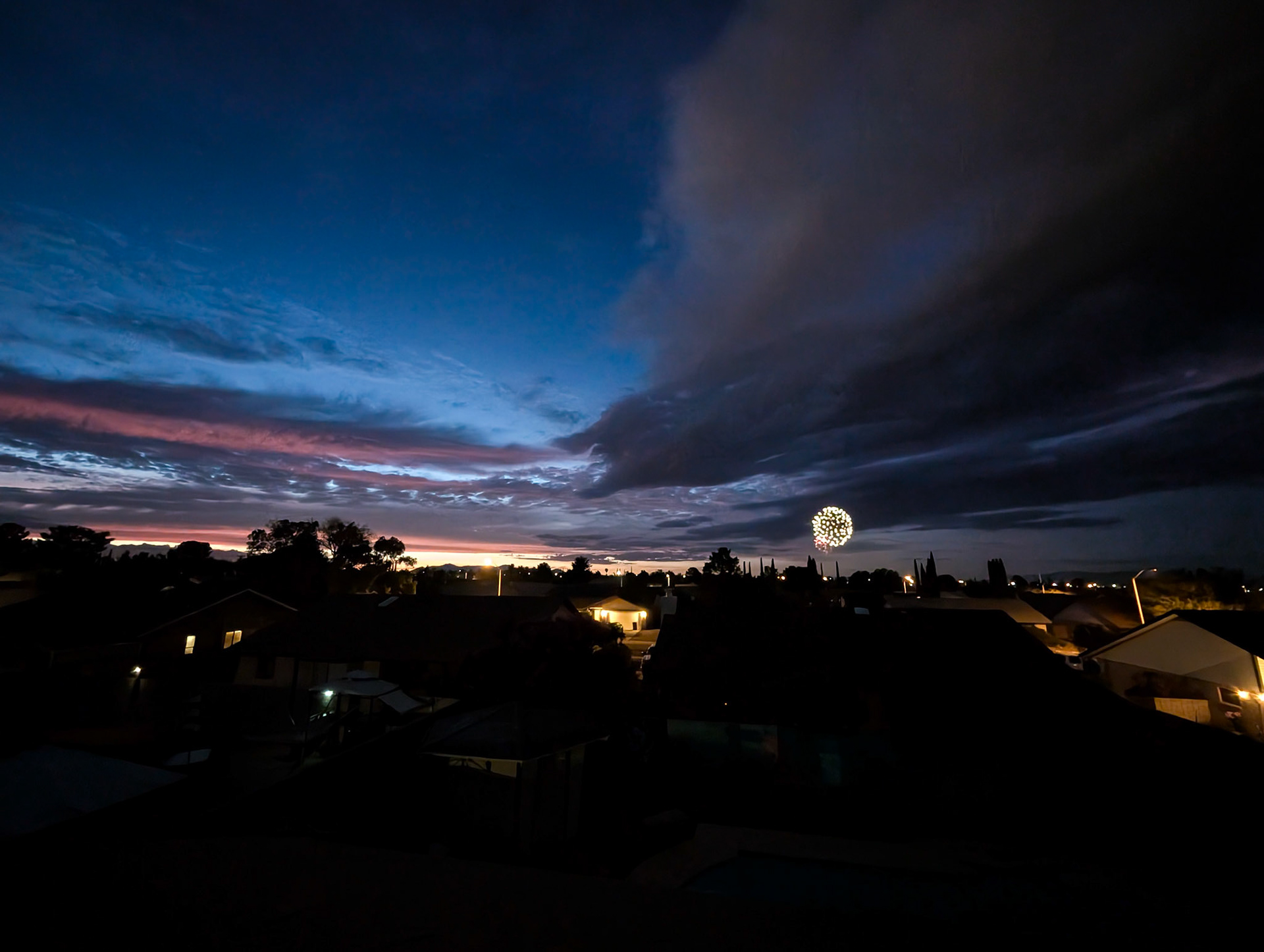 fireworks and a sunset from the roof on the 4th of July