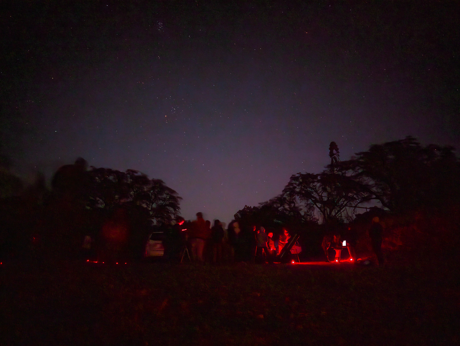 Star gazers lining up to look through the telescopes