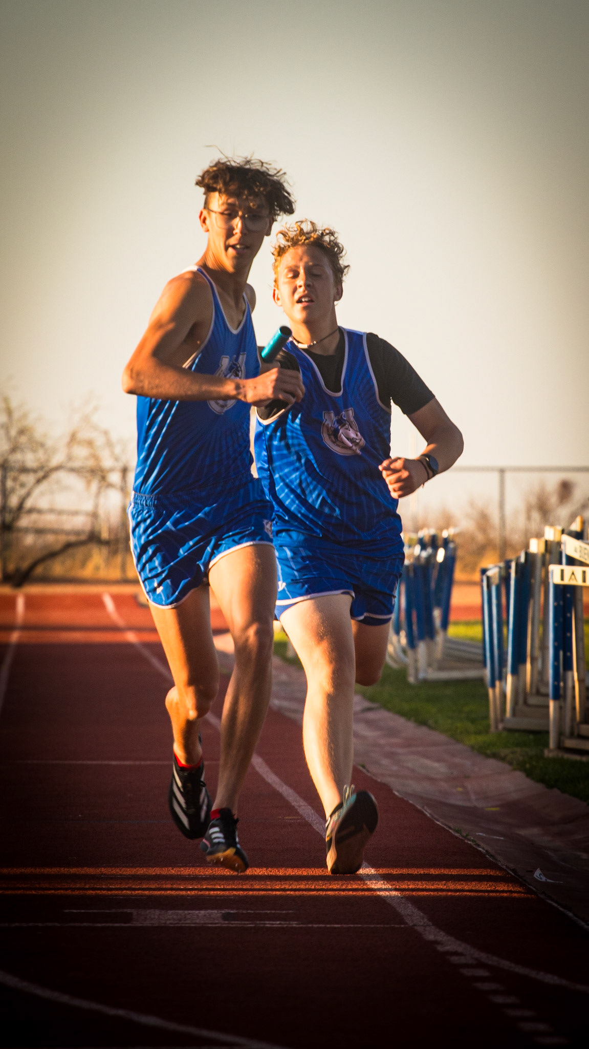 Baton handoff between brothers