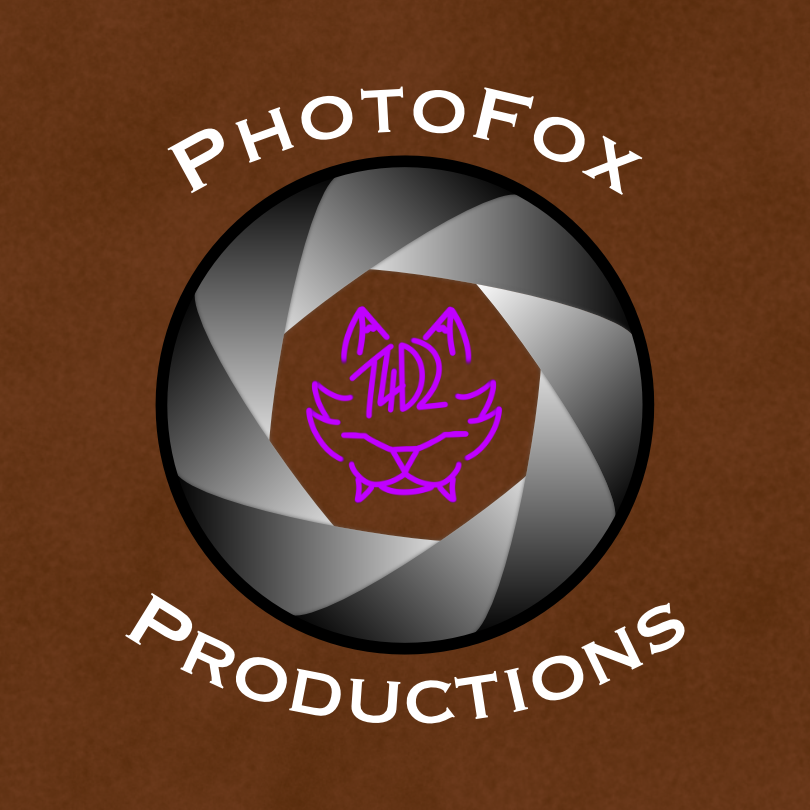 PhotoFoxProductions Logo containing a leatherlike brown background with the text "Photo Fox Productions" in white surrounding a silver camera shutter that has the artists unique purple logo in the middle.