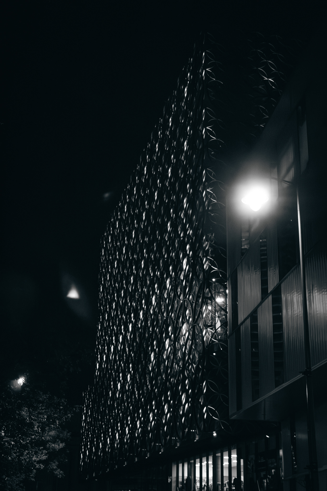 A black and white photo of the back of birmingham library