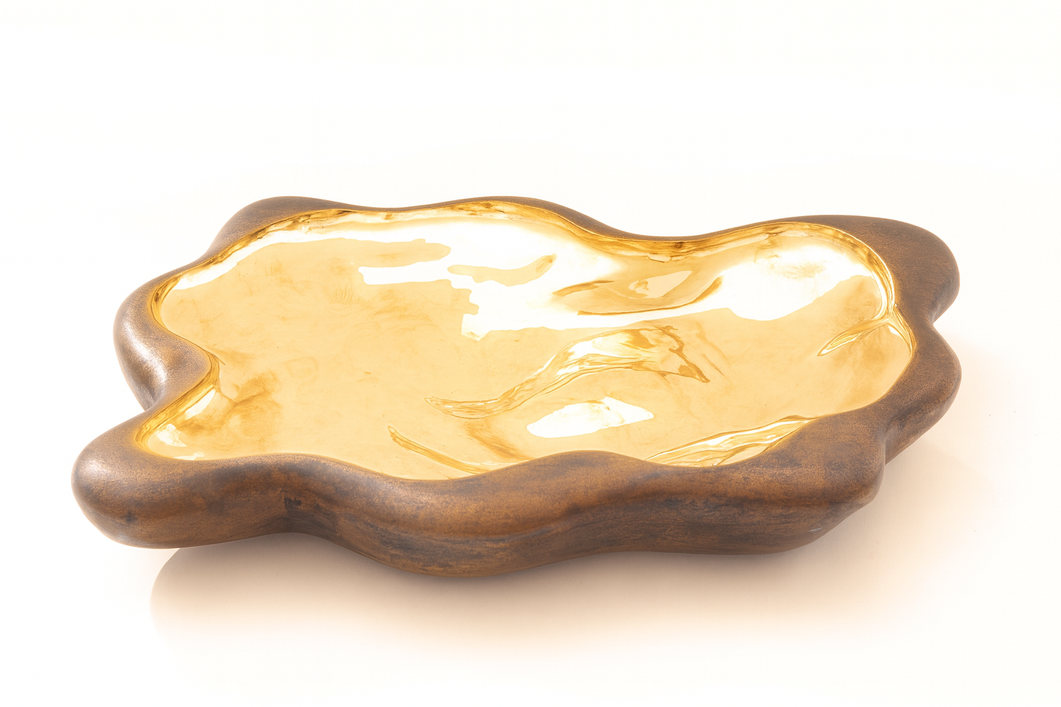 Bronze art bowl capturing movement anchored in metal, a true interior statement piece