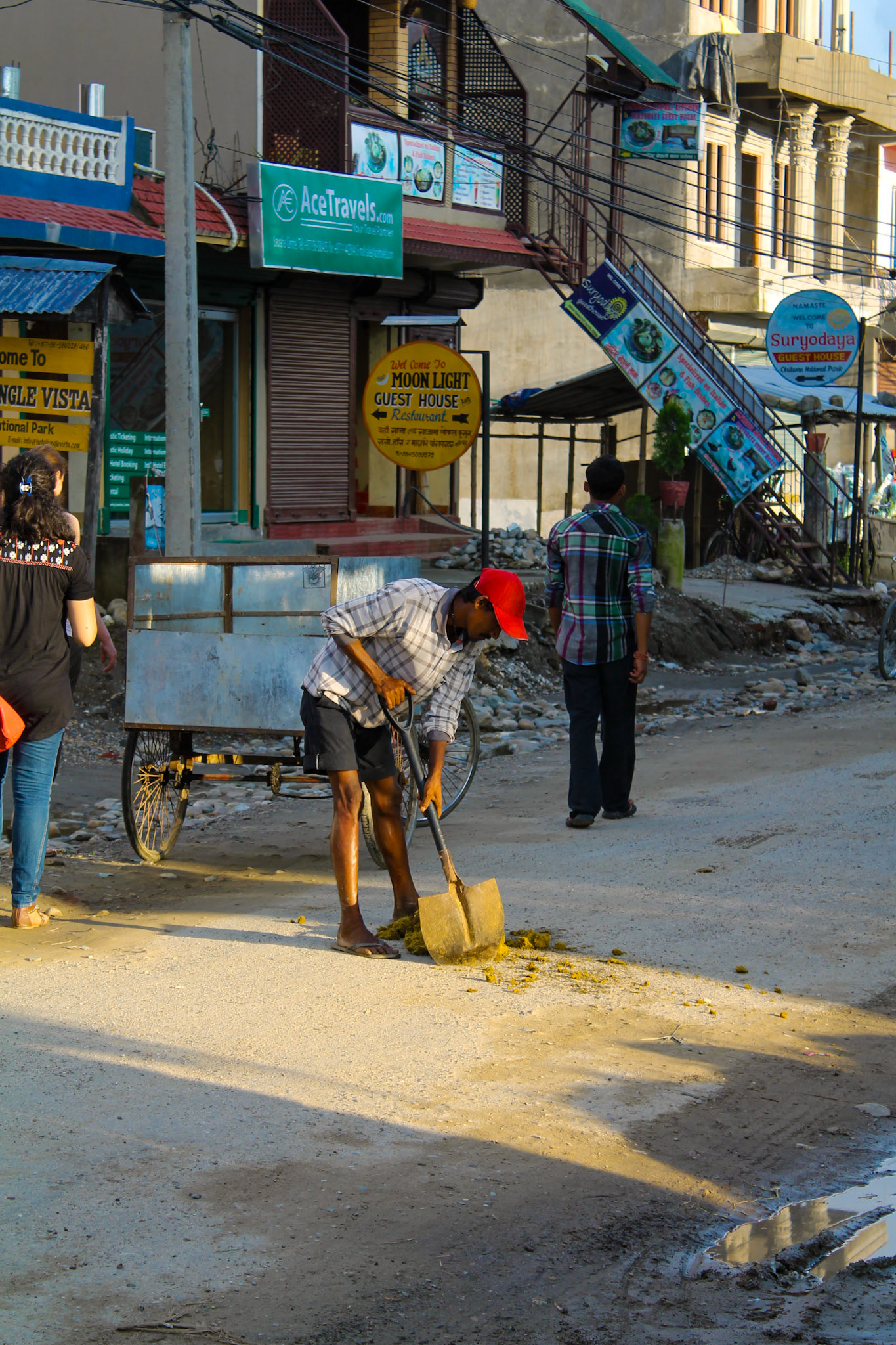 He collects elephant dung thats is refined in to paper, Chitwan