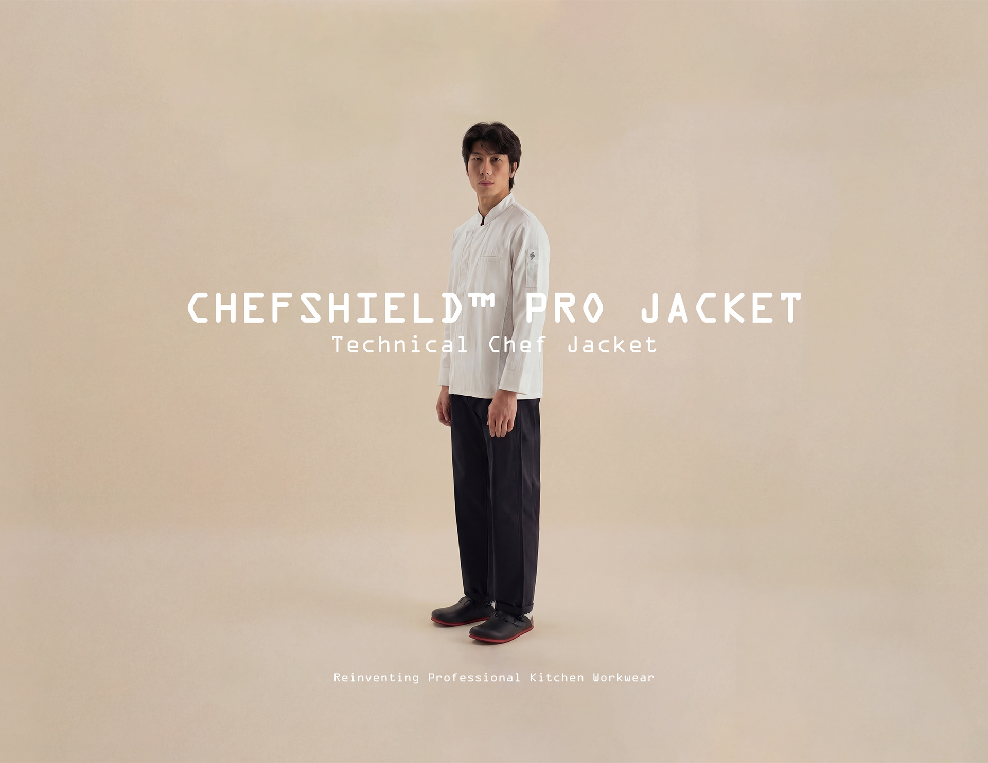 ChefShield™ Pro technical chef jacket designed for professional kitchens featuring hydrophobic fabric technology and modern workwear design