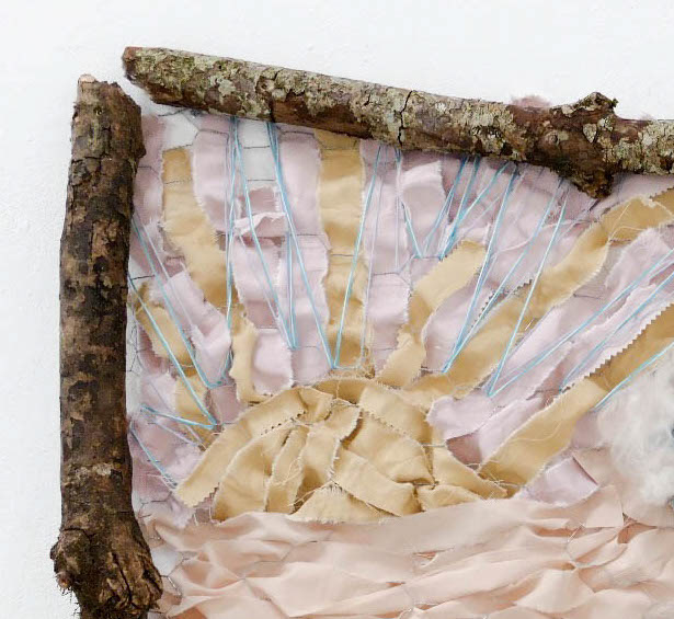 Sunset created from fabric and thread