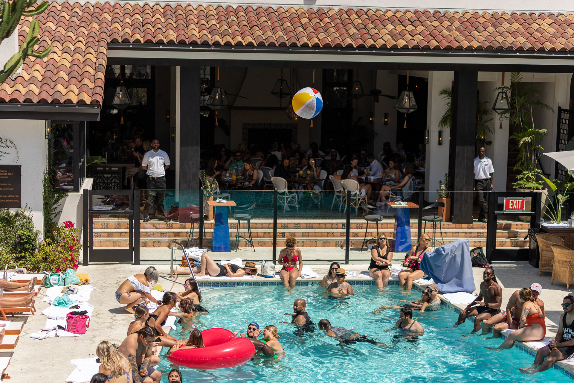 People enjoy the DJ's music at the July 6th Pool Party at Hotel Figueroa in Los Angeles on Jul. 6, 2019.