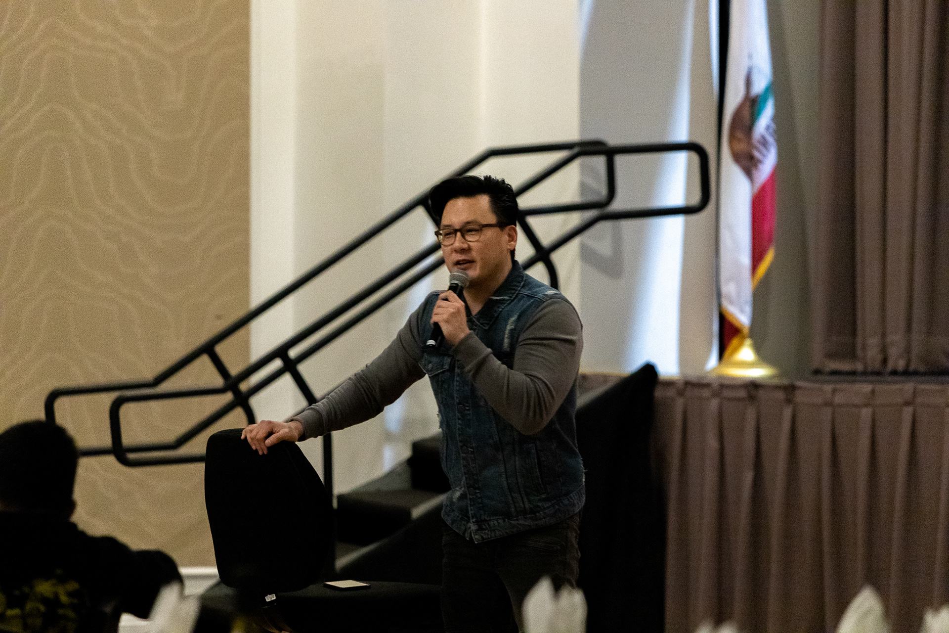 Eliot Chang provides funny moments to the audience at Rolling on the Floor Laughing fundraiser on Jan. 12, 2020.