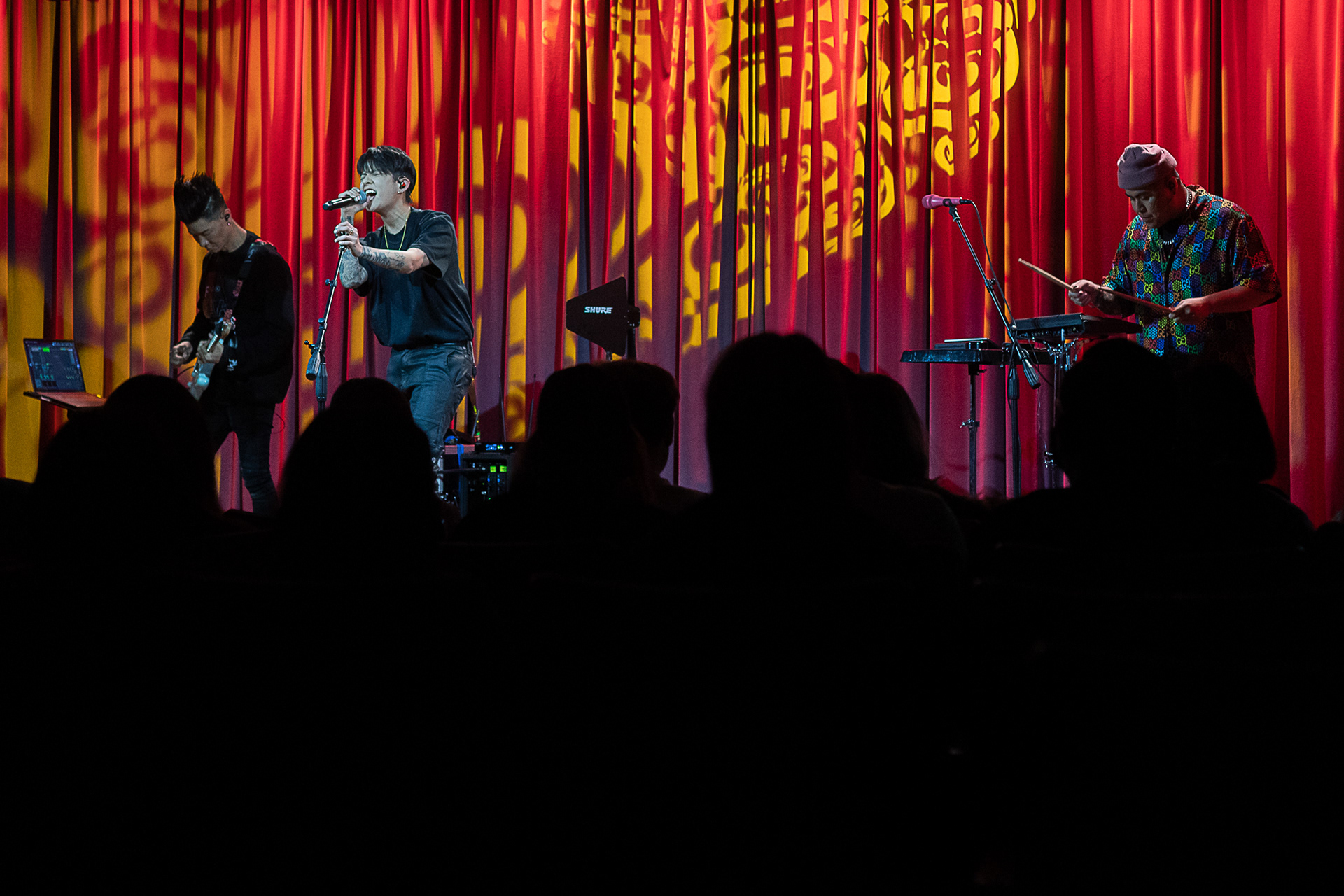 Amber Liu (center) performs with Enik Lin (left) and Mikee McFly (right) during the Global Spin Live event at Grammy Museum on Feb. 23, 2022.