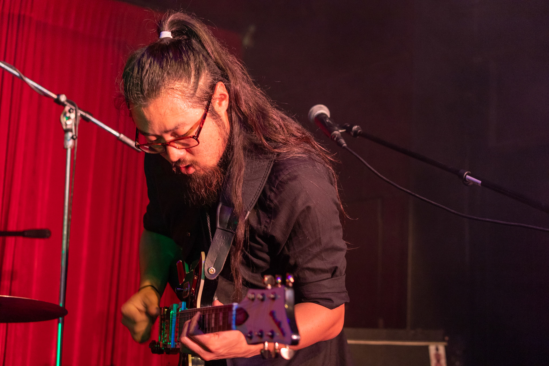 Guitarist Kevin Kim of Westside Wisemen performs at Harvelle's Santa Monica on Jun. 7, 2019.