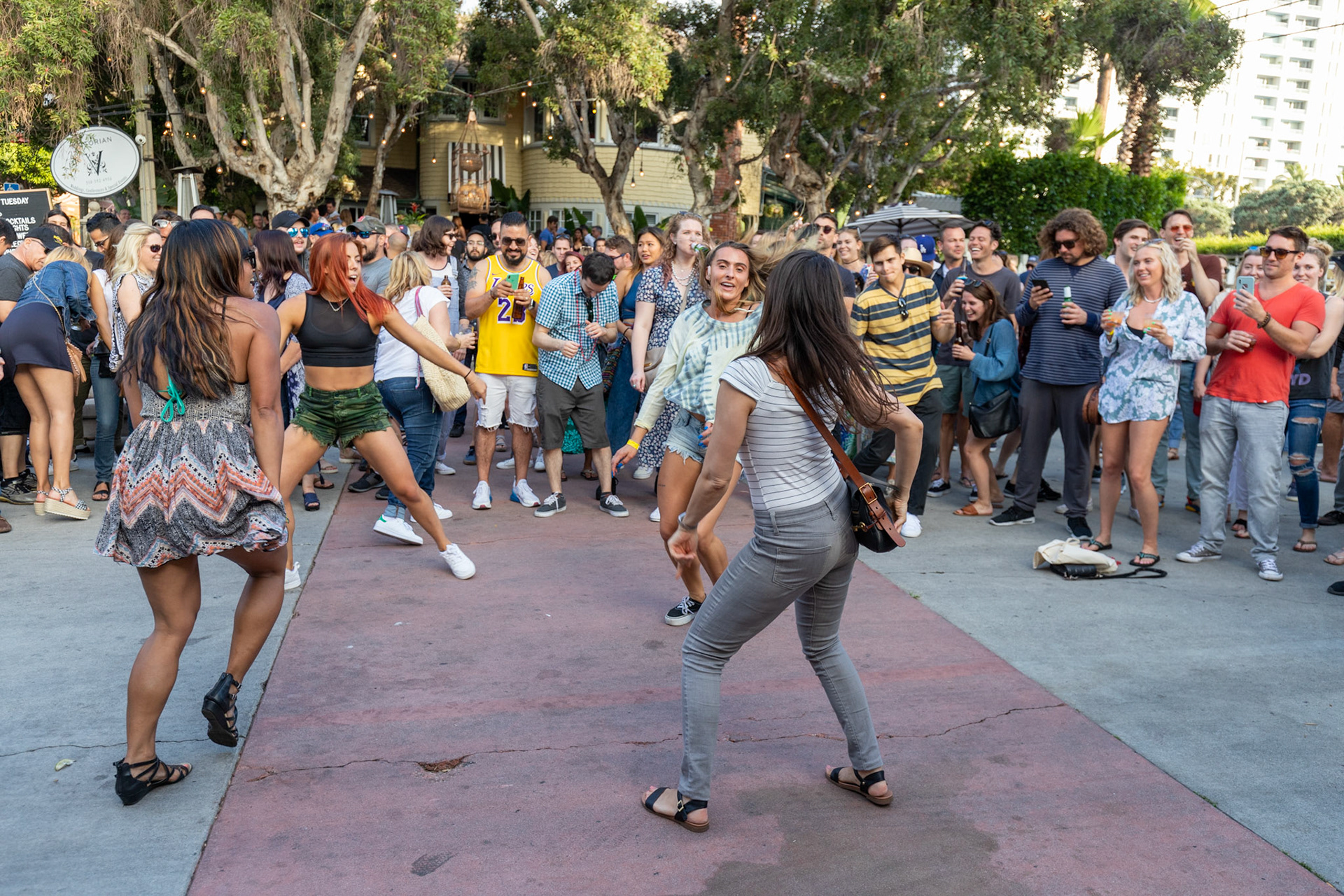 The crowd dances at the 19th Annual Main Street Santa Monica Summer Soulstice Festival in Santa Monica, California on Jun. 23, 2019.