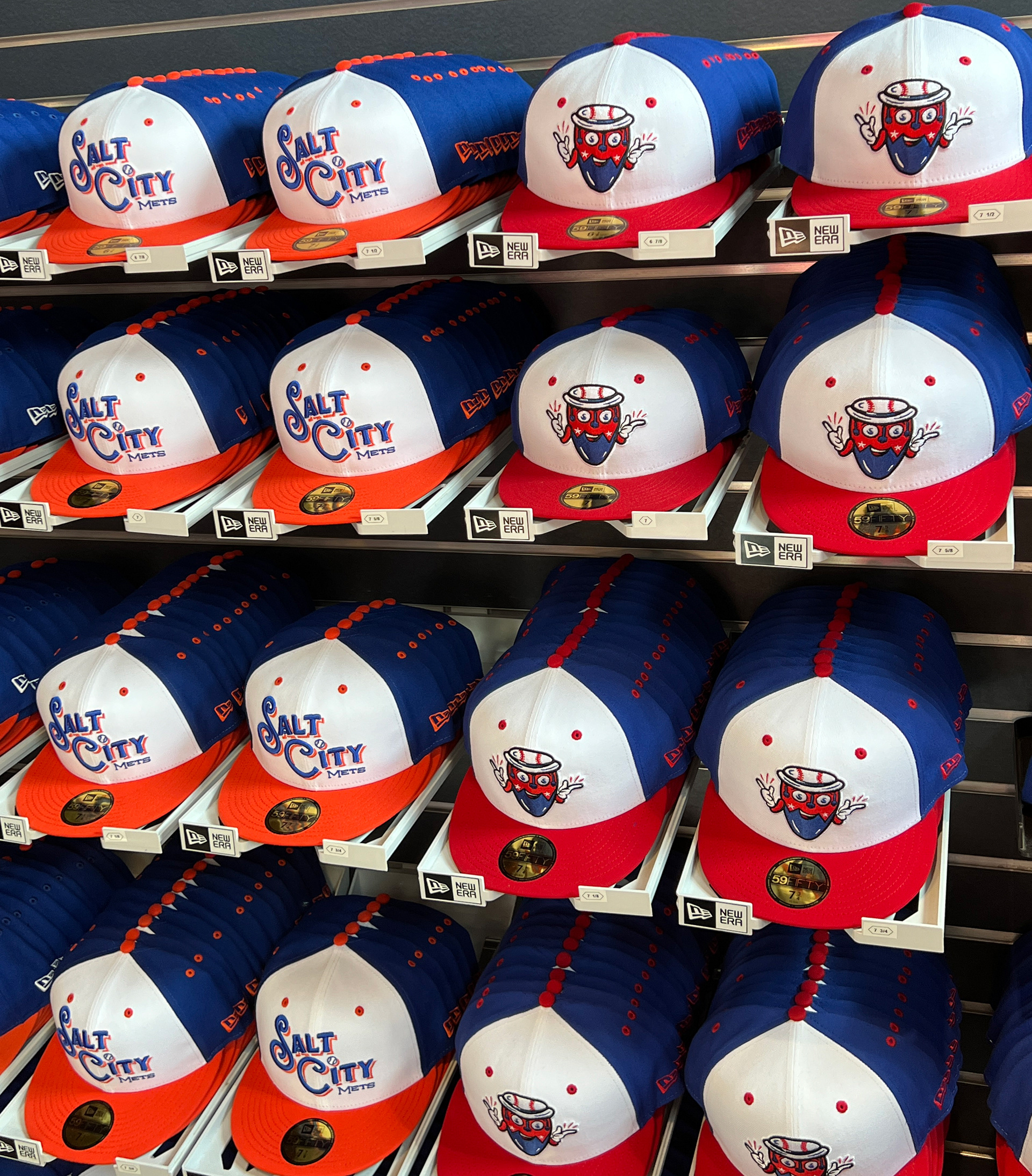 A team store sale display of on-field caps I designed
