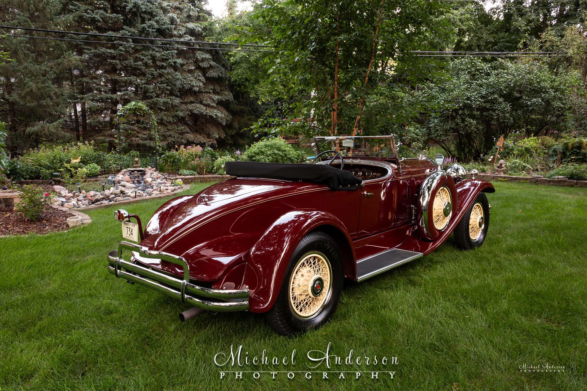 A mint condition red 1930 Packard Boattail prior to light painting it.