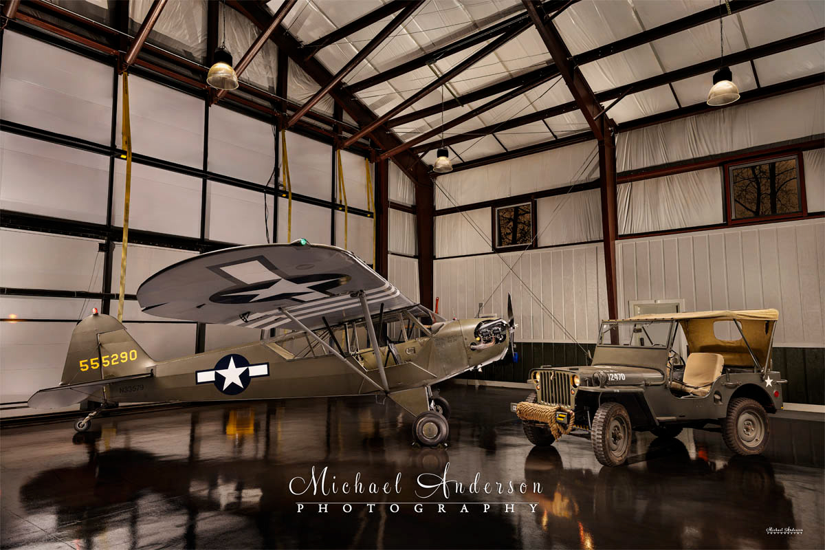 A cool light painted photograph of Piper L-4 N33579 and a Willys “MB” Jeep.