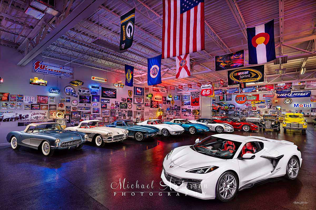 An amazing 14-vehicle light painted photograph created in a cool garage condo.