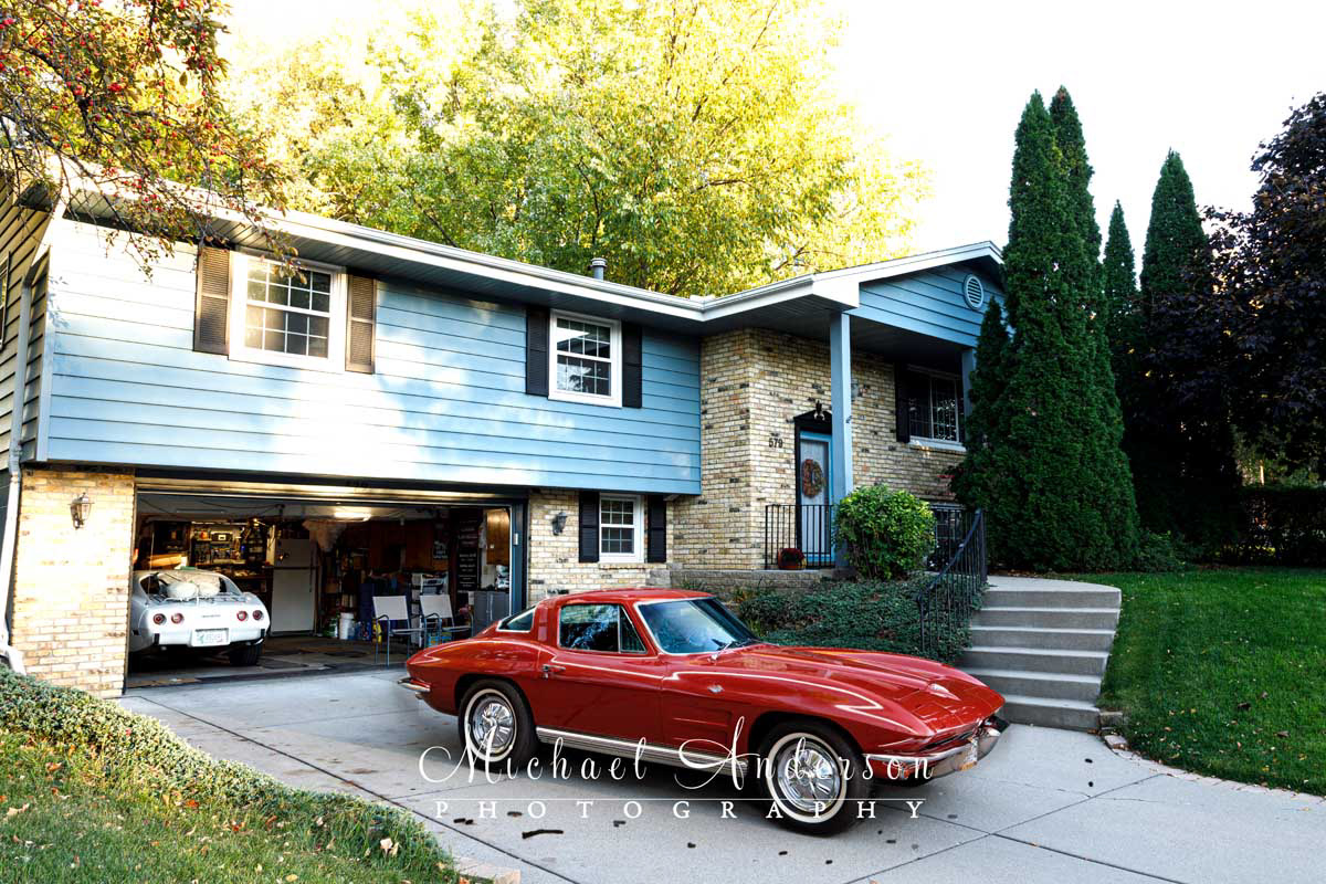 A photo of a 1964 Corvette Sting Ray at the client's home. before light painting both of them.