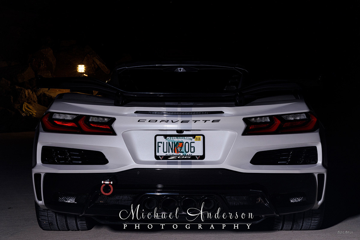 The rear end of a white 2023 70th Anniversary Z06 all set up and ready to be light painted.