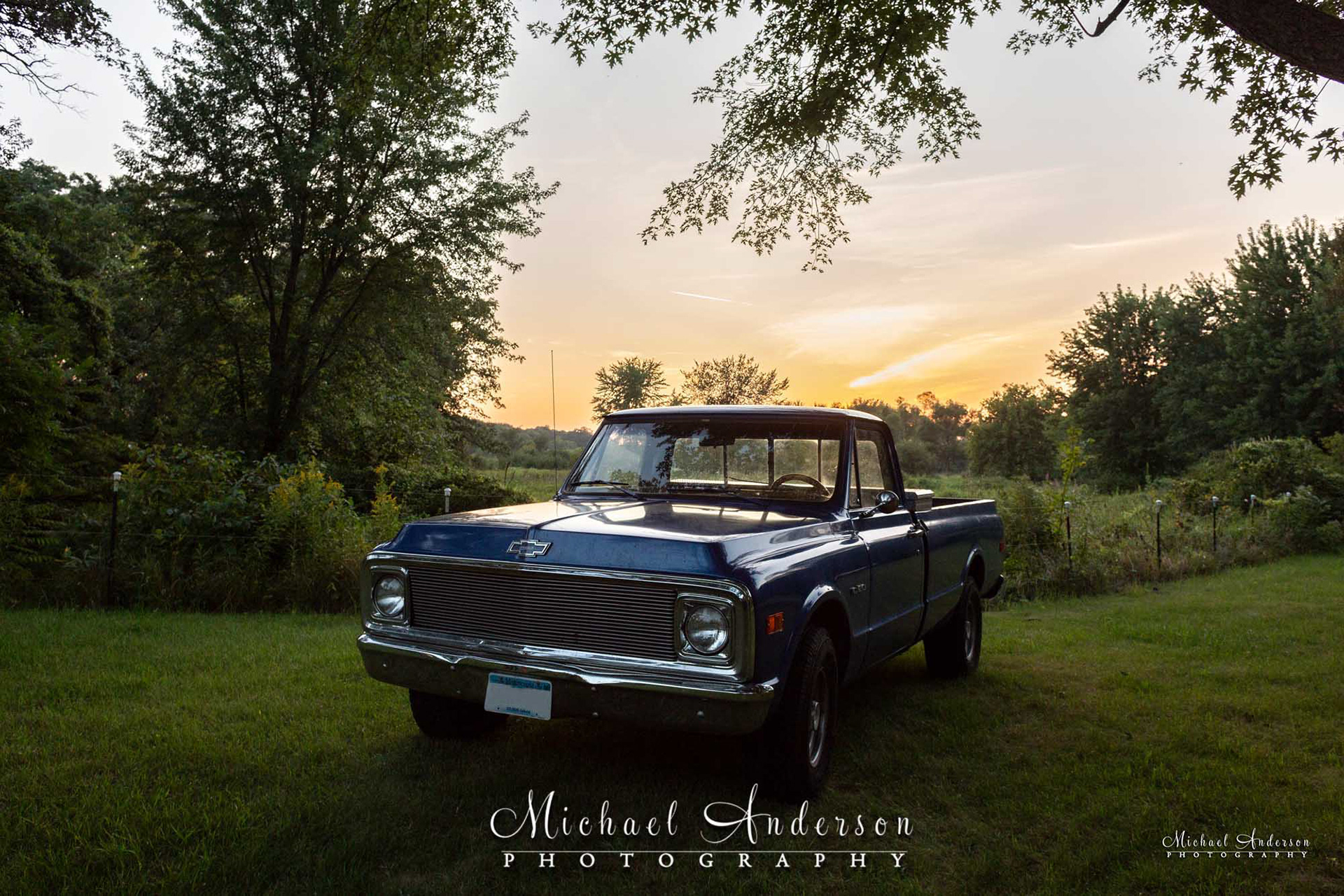 A blue 1969 Chevy truck before light painting it.