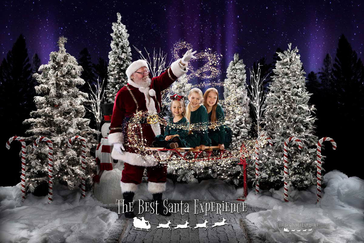 Three sister's take a ride on Santa's Magic Sled at The Best Santa Experience. This is "Santa's Enchanted Forest", one of the yearly themes at the event that raises money to find a cure for Cystic Fibrosis.