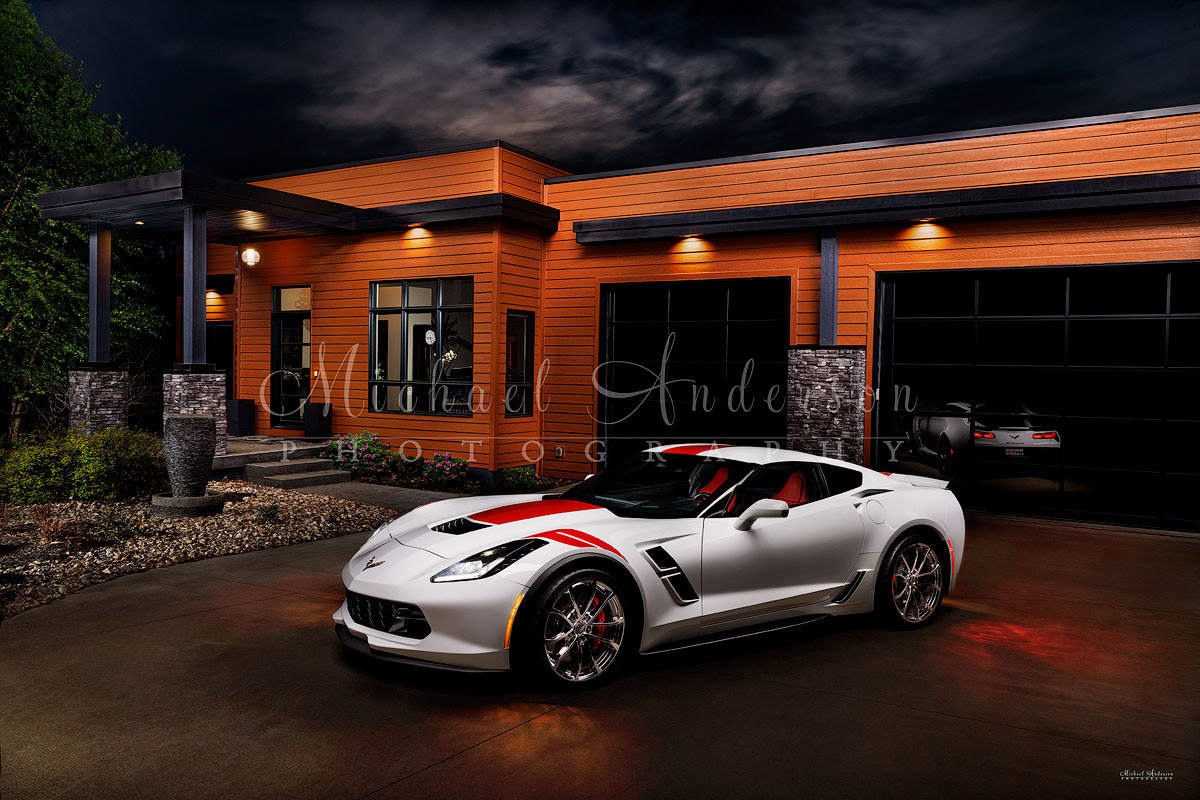 A stunning light painted photograph of a 2017 Corvette Grand Sport in front of the client's beautiful contemporary home at Lake of the Ozarks, Missouri.