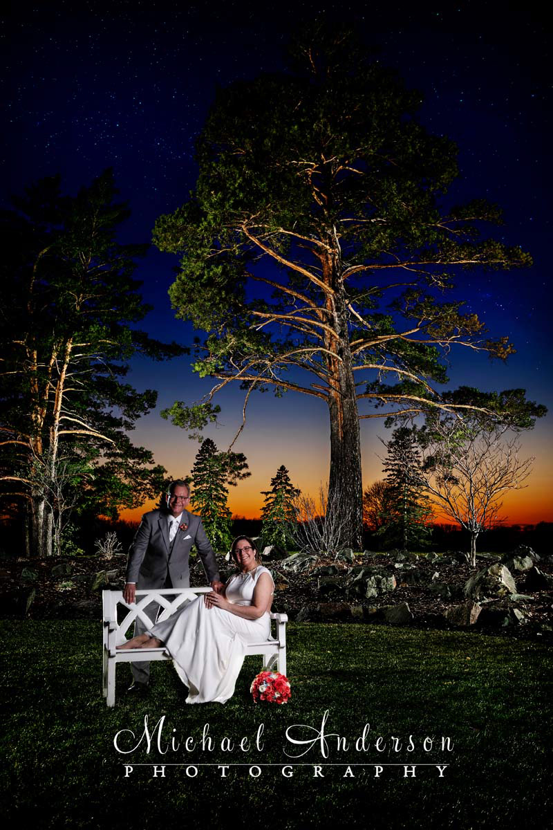 A stunning light painted wedding photograph created at dusk at Dellwood Hills Country Club, in Dellwood, MN.