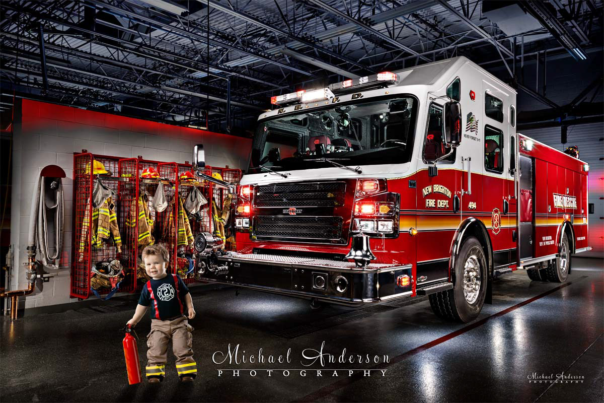 Light painted photo of New Brighton, Minnesota Fire Truck #494, with a little boy and his fire extinguisher.