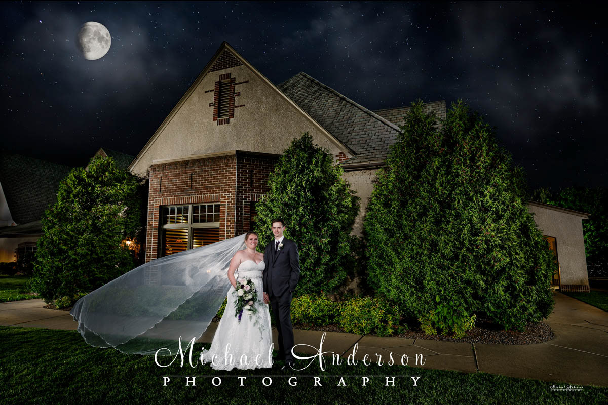 A pretty light painting, under a near full moon, that we created during their wedding dance at Golden Valley Country Club in Golden Valley, Minnesota.