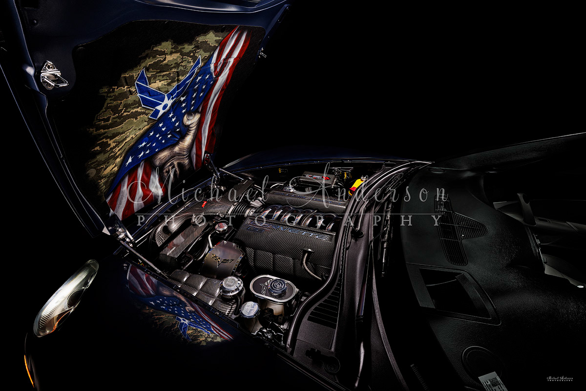 A stunning photograph of the engine bay of a 2013, 60th Anniversary, Corvette Grand Sport 3LT.