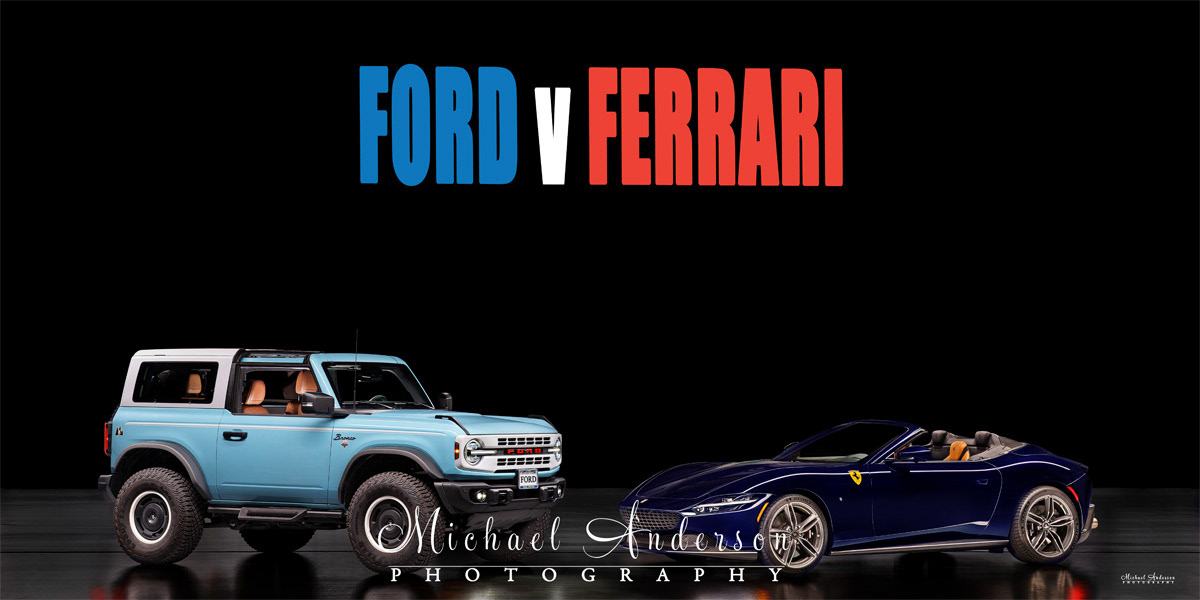 A cool light-painted photo of a 2024 Ford Bronco Heritage Edition & 2025 Ferrari Roma Spider.
