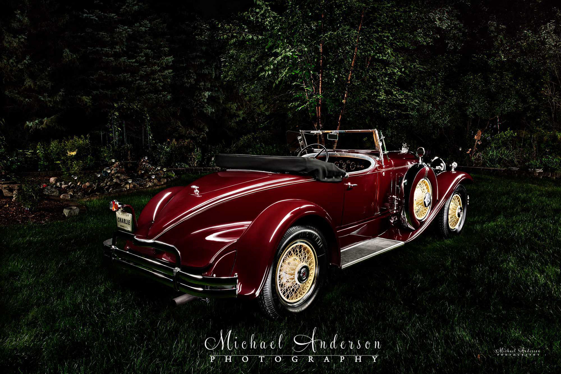 Light painting of a mint condition red 1930 Packard 734 Boattail Speedster.