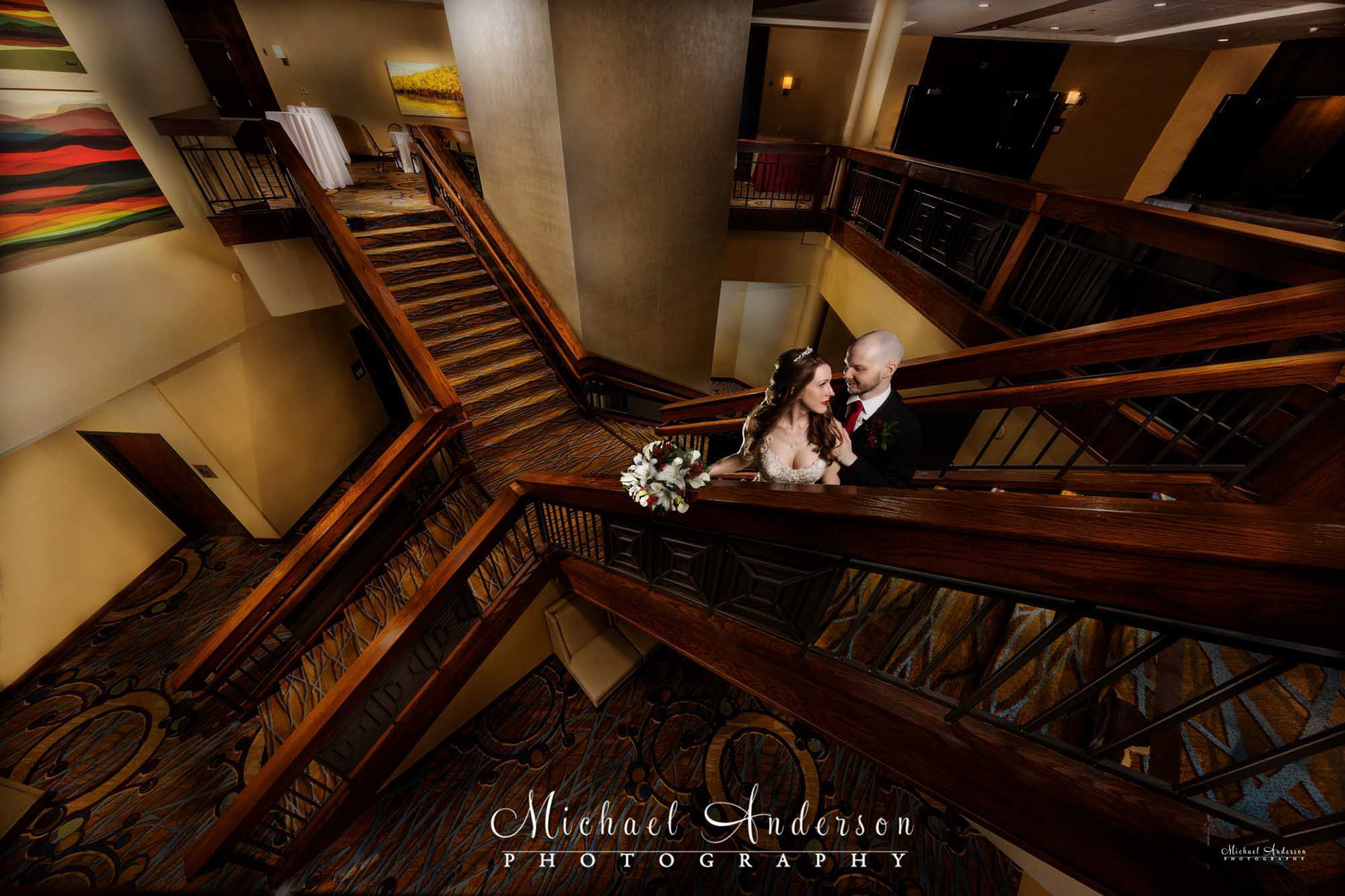 A unique wedding photograph created on the Grand Staircase at the Minneapolis Marriott Northwest in Brooklyn Park, MN.