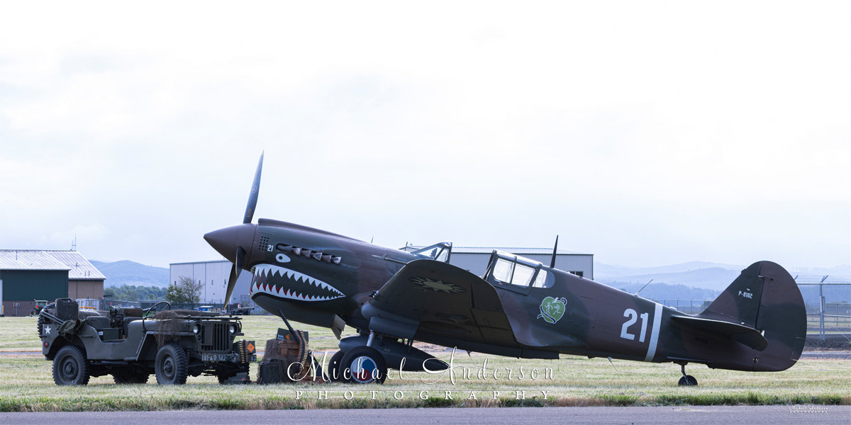 The setup for the light painting of a restored P-40 Kittyhawk and a WWII Willys Jeep.