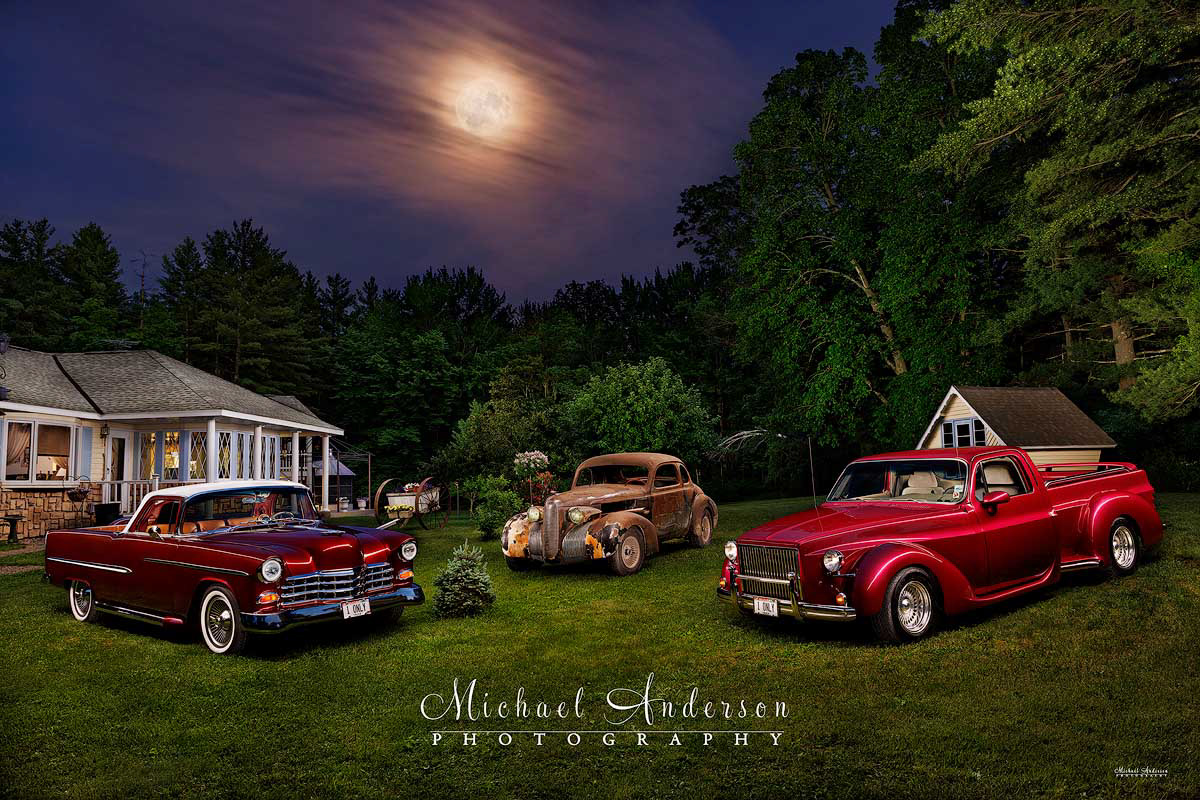 A stunning light painted photograph of three amazing RestoMods. A 1955 Chevrolet Bel Air "El Camino" pickup truck with a Cadillac front-end, a 1939 LaSalle Rat Rod, and a 1978 Chevy Custom 3/4 ton pickup.