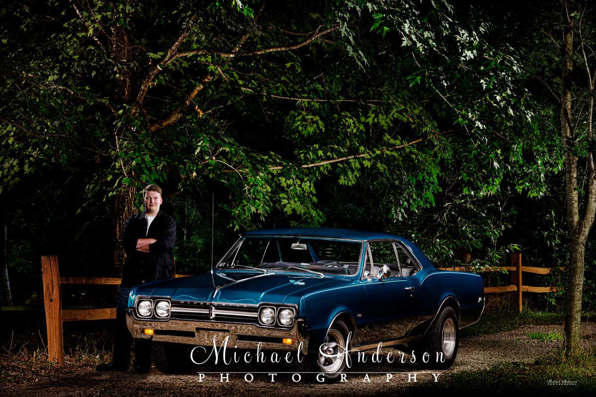 A cool light painting senior portrait with an amazing 1966 Oldsmobile Cutlass F-85!