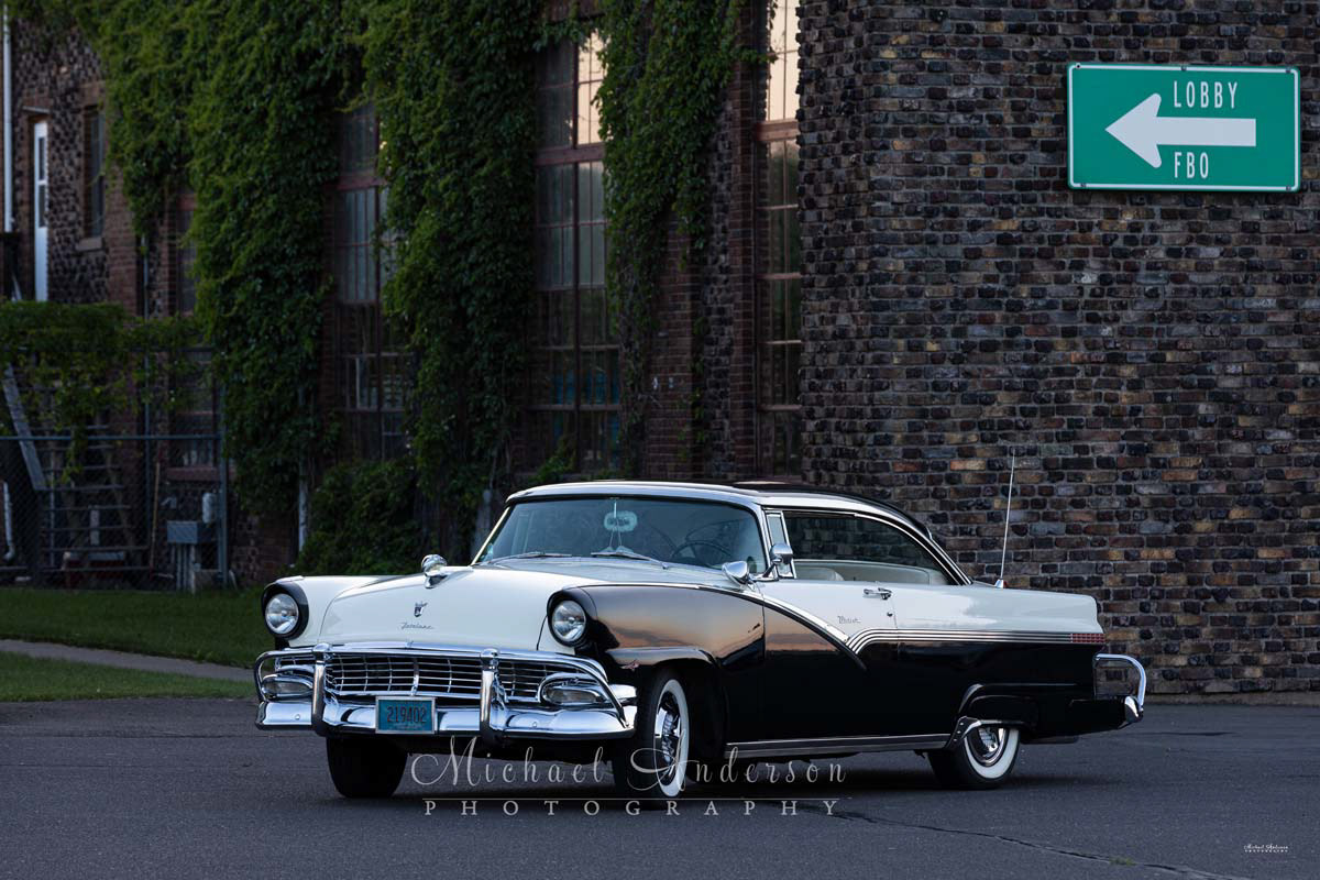 Photo of a black and white 1956 Ford Victoria at the Richard I Bong Airport in Superior, Wisconsin prior to light painting it.